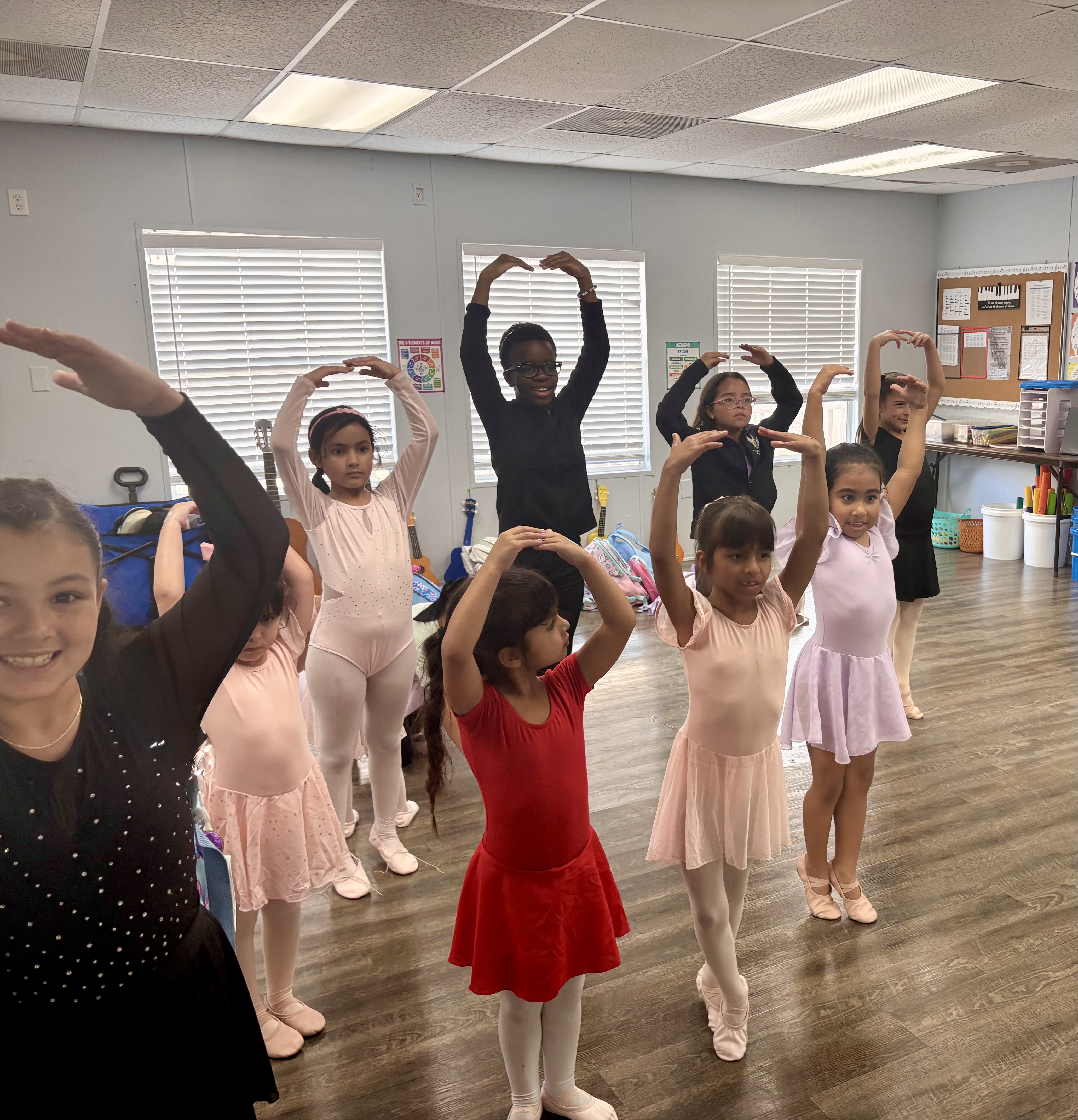 Ballet students practicing in class