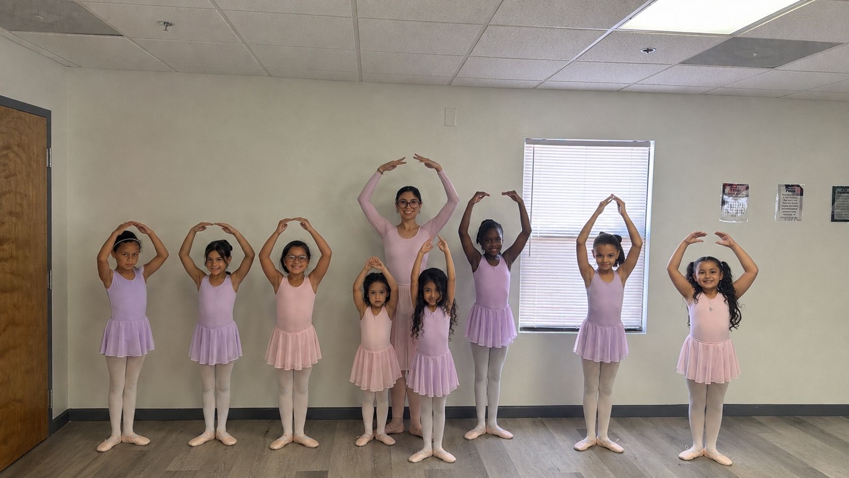 Ballet students posing together